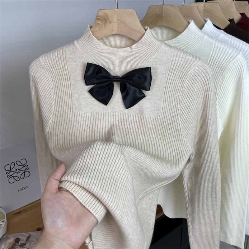 Demi-season solid color knitted warm sweater with bow with a round…