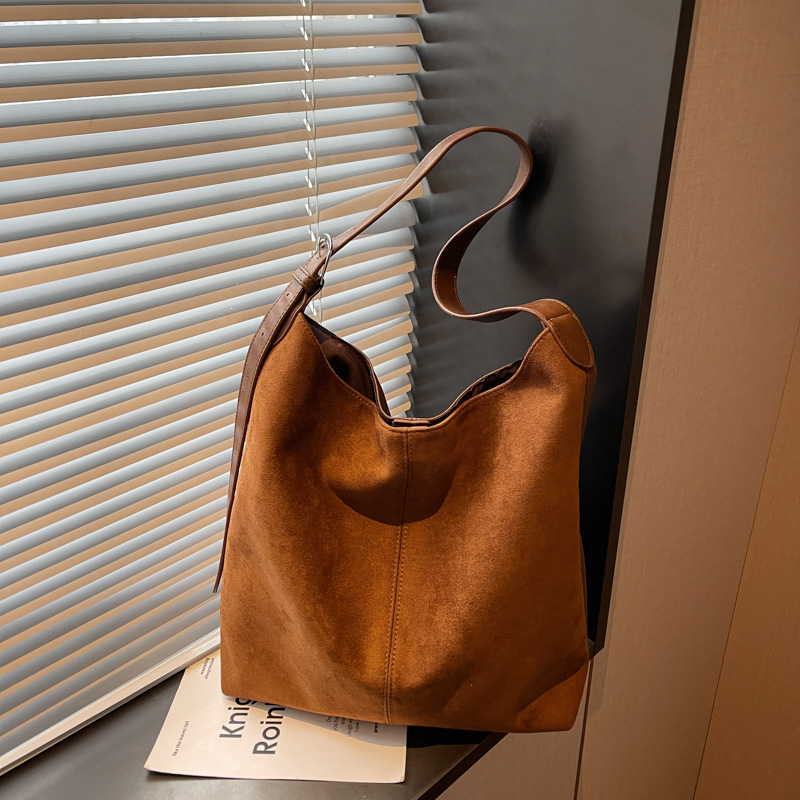 Bolsa retro esmerizada de terro para mujeres 2025 nueva gran capacidad de viaje de un solo hombro bolsas de cubo bolsas de ocio