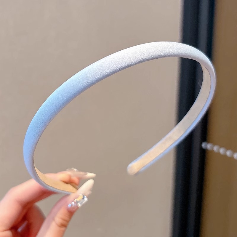 Retro coreano simple arco de cabello con arco de cabello alto cráneo sensación de alto grado otoño y invierno nuevo tipo de arco de cabello gris