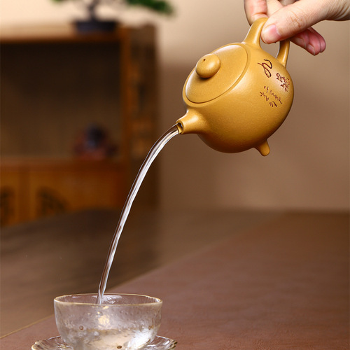 Yixing handmade purple clay pot wholesale live supply gift pot household raw ore section mud three-legged nine tripod pot