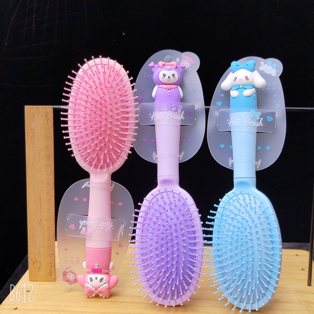 Bonito peine de peinado color macarrón con cojín de aire para masaje, adecuado para uso doméstico y dormitorios estudiantiles, cepillo de pelo de plástico suave con cojín de aire.