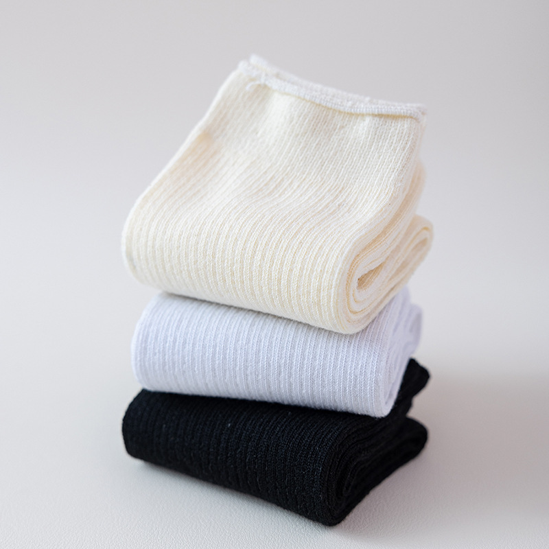 Otoño e Invierno de color sólido de las mujeres JK Lolita calcetines japoneses de punto calcetines cálidos de media pantorrilla Medias Blancas de las mujeres del todo fósforo