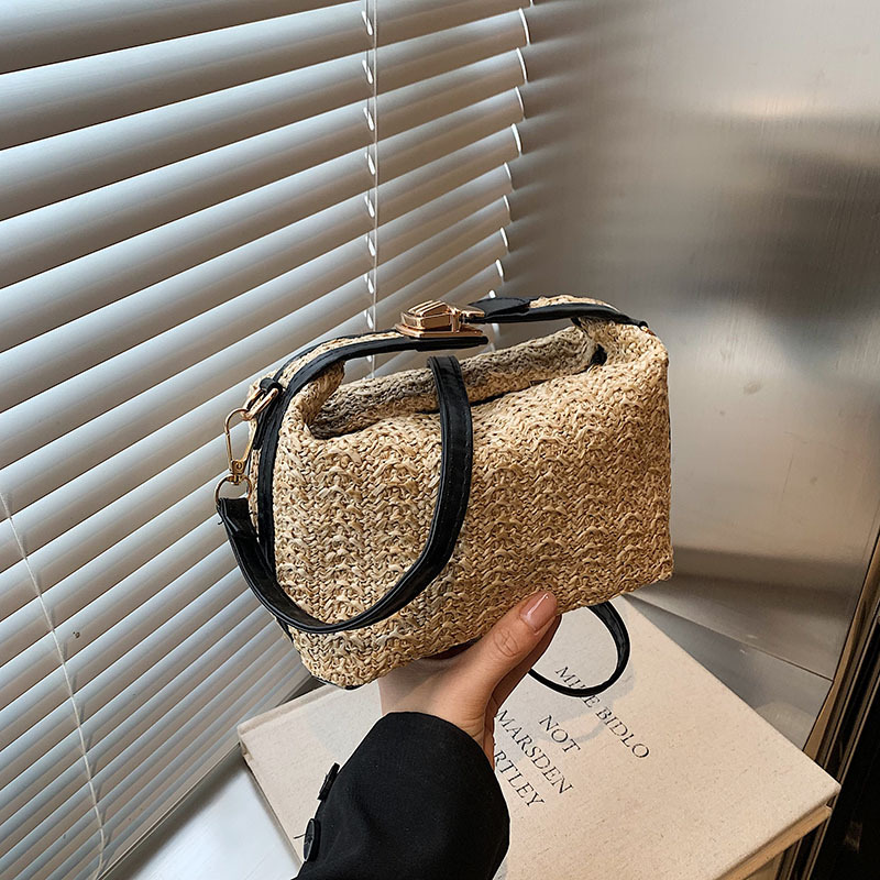 Bolsa de vacaciones de paja de estilo de verano para mujeres, nuevo nicho de diseño de hombro, bolso de mano, bolso de vacaciones de playa