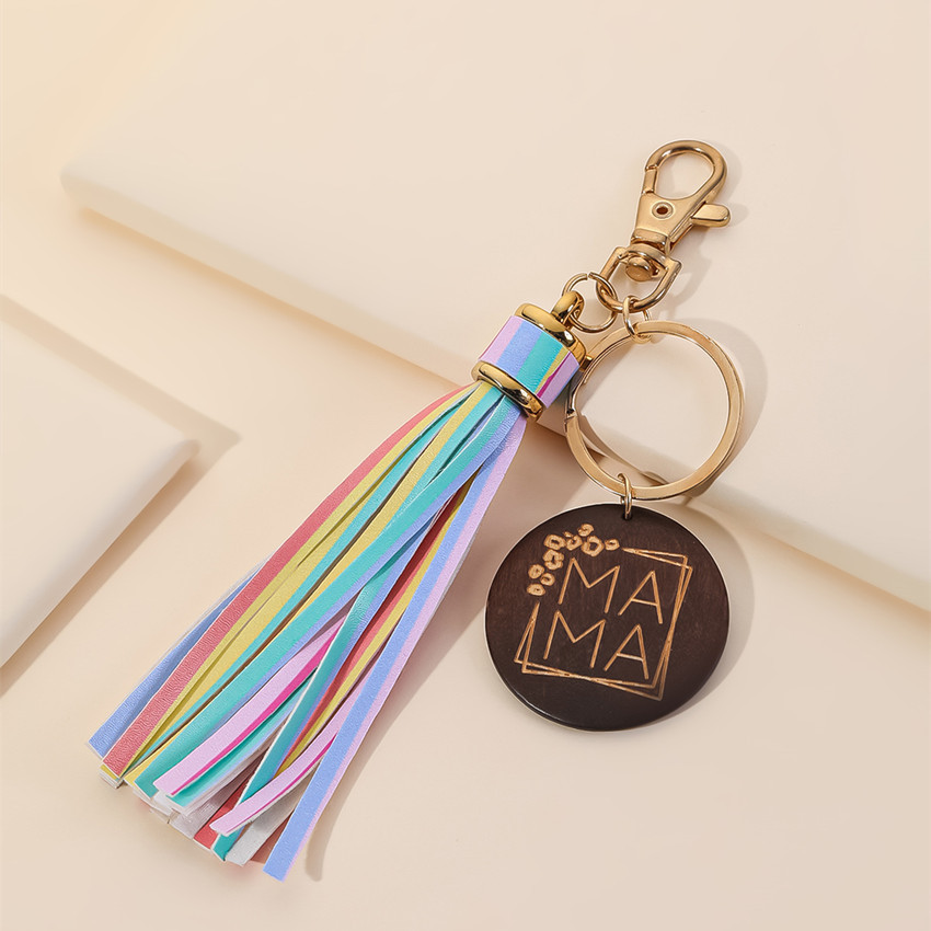 17g Weight Keychain Classification 1 Piece Quantity Casual, Holiday, Daily Occasion Pu Leather Material Mother'S Day Festival Letter, Tassel Pattern Unisex Gender Modern Style Style Modern Style Letter Tassel Pu Leather Mother'S Day Unisex Keychain 9