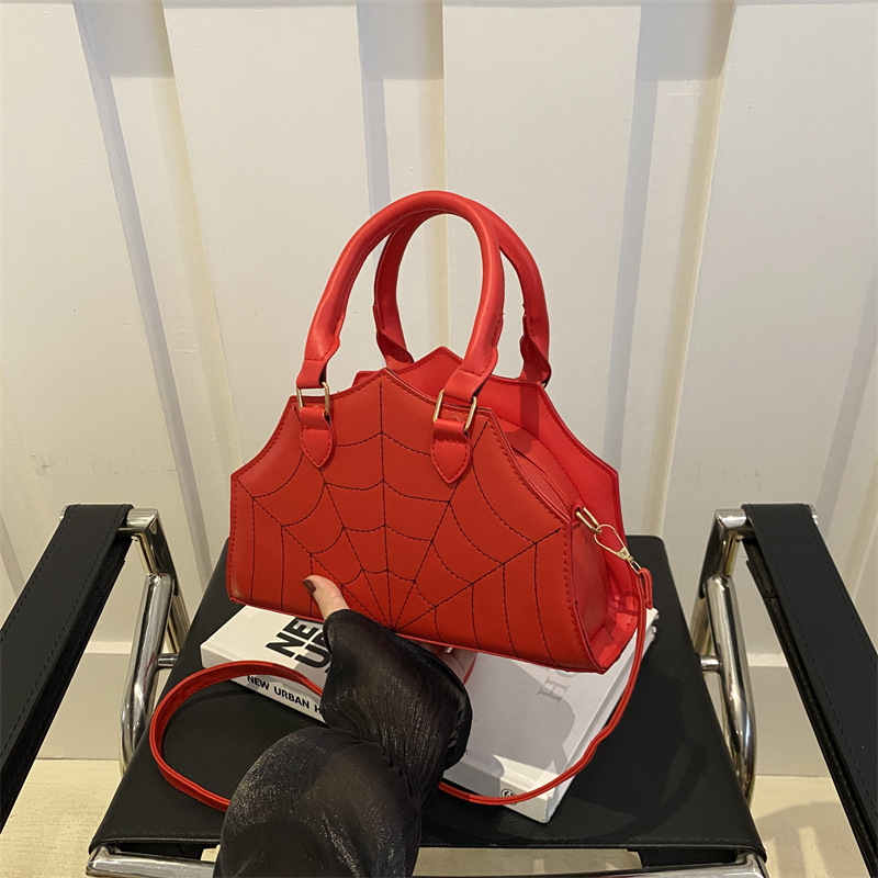 2024 nuevo bolso de tela de araña de moda personalidad extraña bolso de hombro en bordado simple bolso de mochila extranjero