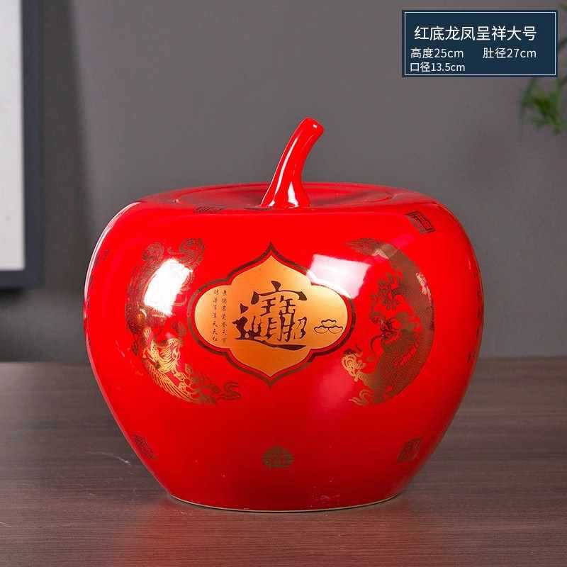 .빨간색 바닥과 뚜껑이 있는 대형 사과.