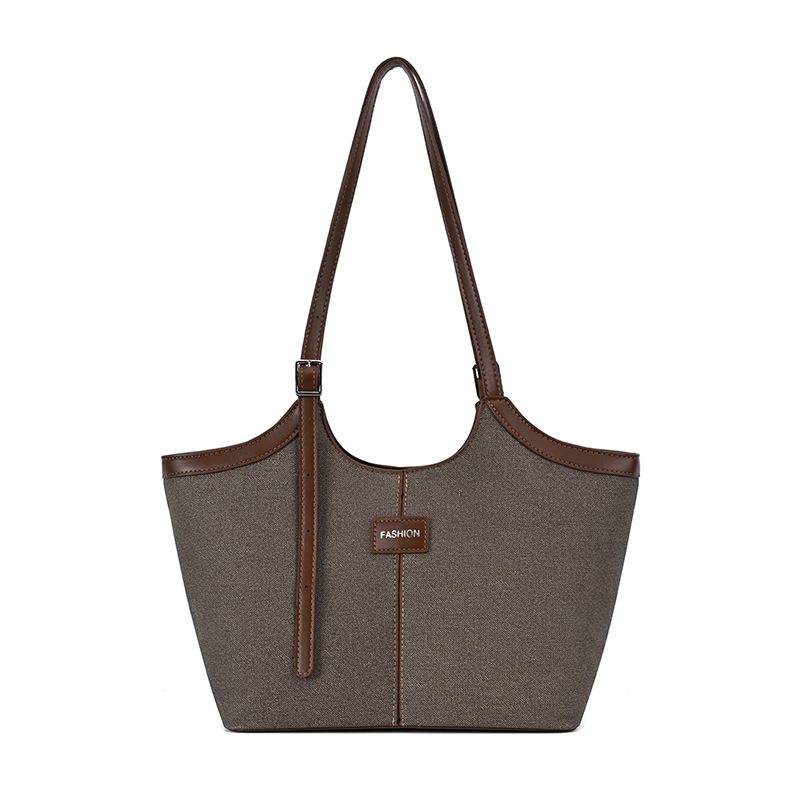 Bolsa de mano retrógrada de nicho para mujeres 2026 comercio exterior nuevo color de choque de alta calidad bolso de hombro de gran capacidad