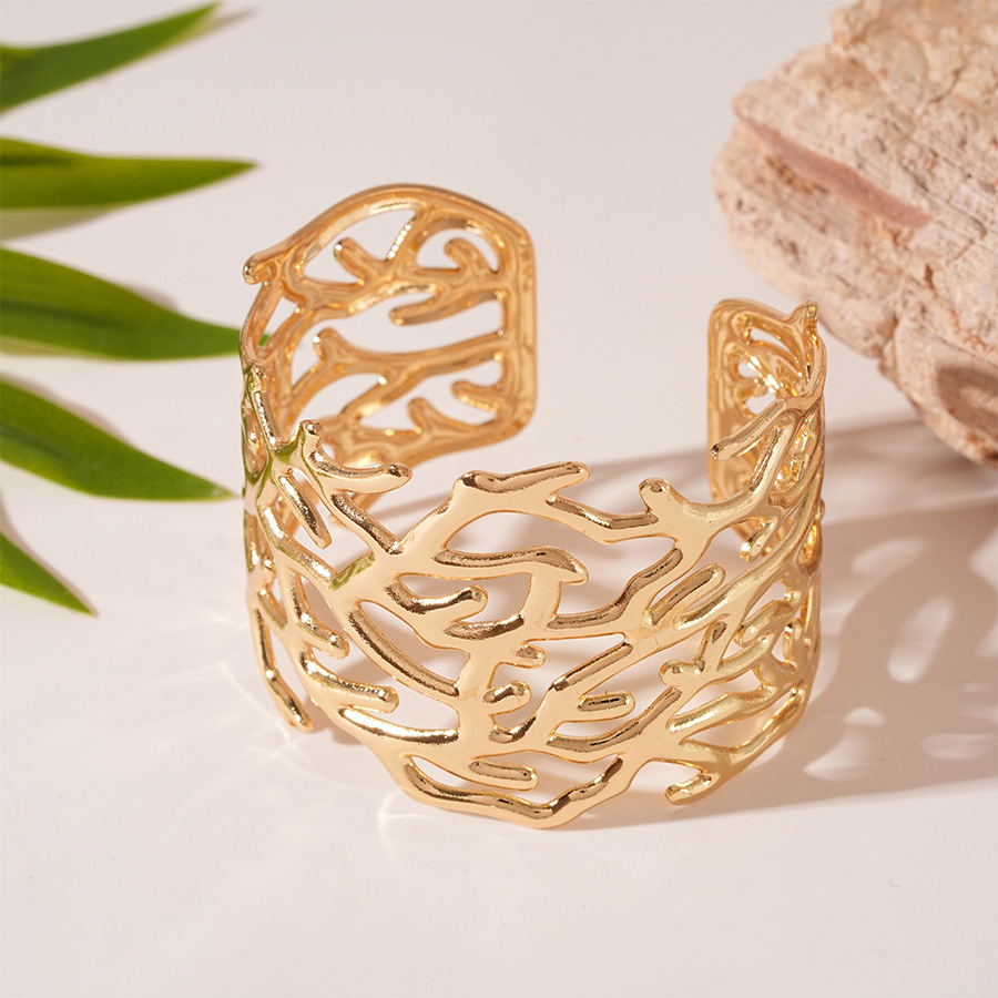 Pulsera de apertura geométrica irregular metálica europea y americana, personalidad exagerada, temperamento de nicho simple, joyería de alta gama femenina