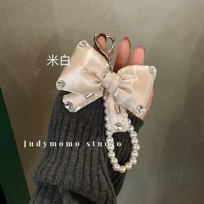 New Style Pearl String Bowknot with Shiny Diamond 3D-Filled Colorful Phone Charm, Niche Bag Keychain New Style Pearl String Bowknot with Shiny Diamond 3D-Filled Colorful Phone Charm, Niche Bag Keychain