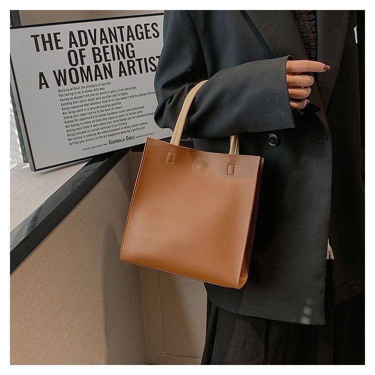 2024 New Bags Korean Version Versatile Commuting Bags Large Capacity Portable Tote Bag Temperament Popular Women’s Bag Vertical Style_voghion.com