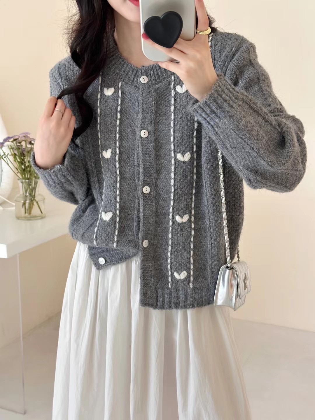 Cute autumn cardigan with a round collar