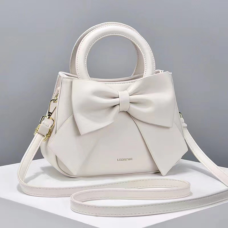 Bolso de mano de moda para mujer de Taizhou, versátil, con lazo, ligero, de lujo, bolso de hombro, bandolera.