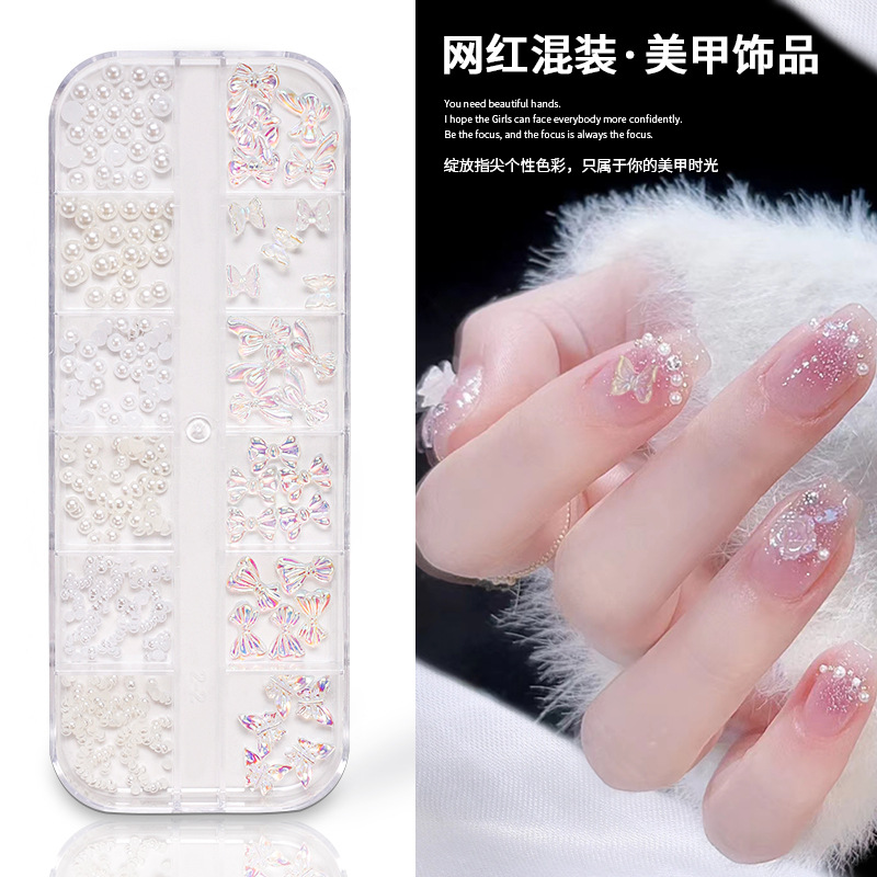 Joyería de uñas Aurora arco perla remache pequeños accesorios Super Flash pequeño diamante 12 rejilla mixta decoración de uñas al por mayor