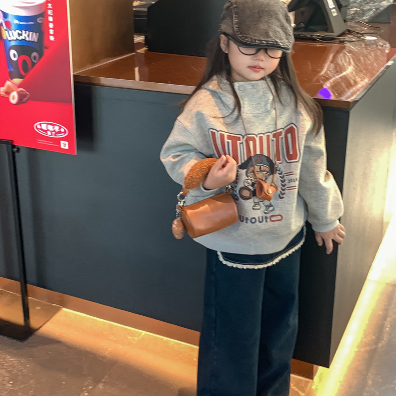 2025 otoño y invierno nuevo bolso infantil de moda coreana mini niñas bolso de peluche lindo colgante bolso cilíndrico