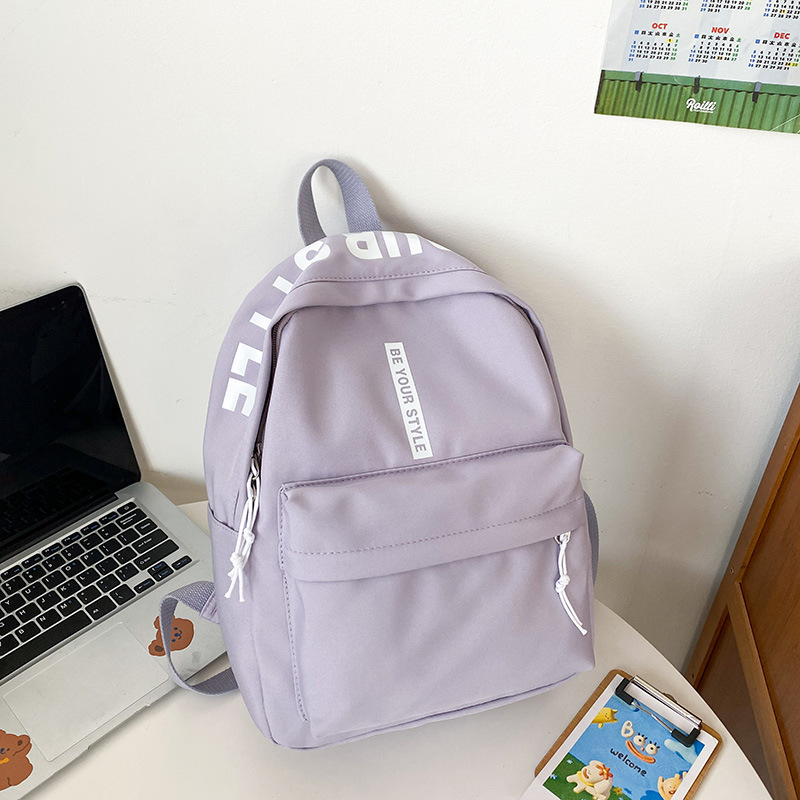 Mochila al aire libre para hombres y mujeres frescas dulces bolsas de ocio coreanas estudiantes pequeñas y ligeras bolsas de moda al por mayor