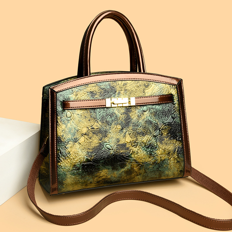 2024 nueva moda impresa bolsos de madres bolsos populares bolsos de hombro de mujer simple bolsos de mano de gran capacidad