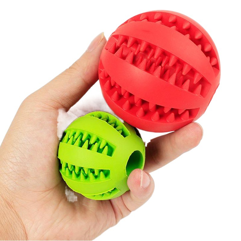 Bola de juguete para mascotas en stock nueva mordedura transfronteriza sabor a leche perro de goma sandía Limpieza de dientes bola para mascotas juguete al por mayor