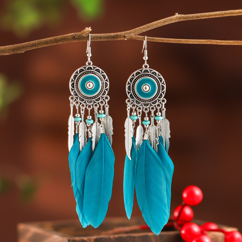 Vintage Geometric Round Alloy Long Feather Leaves Tassel Earrings Wholesale display picture 1