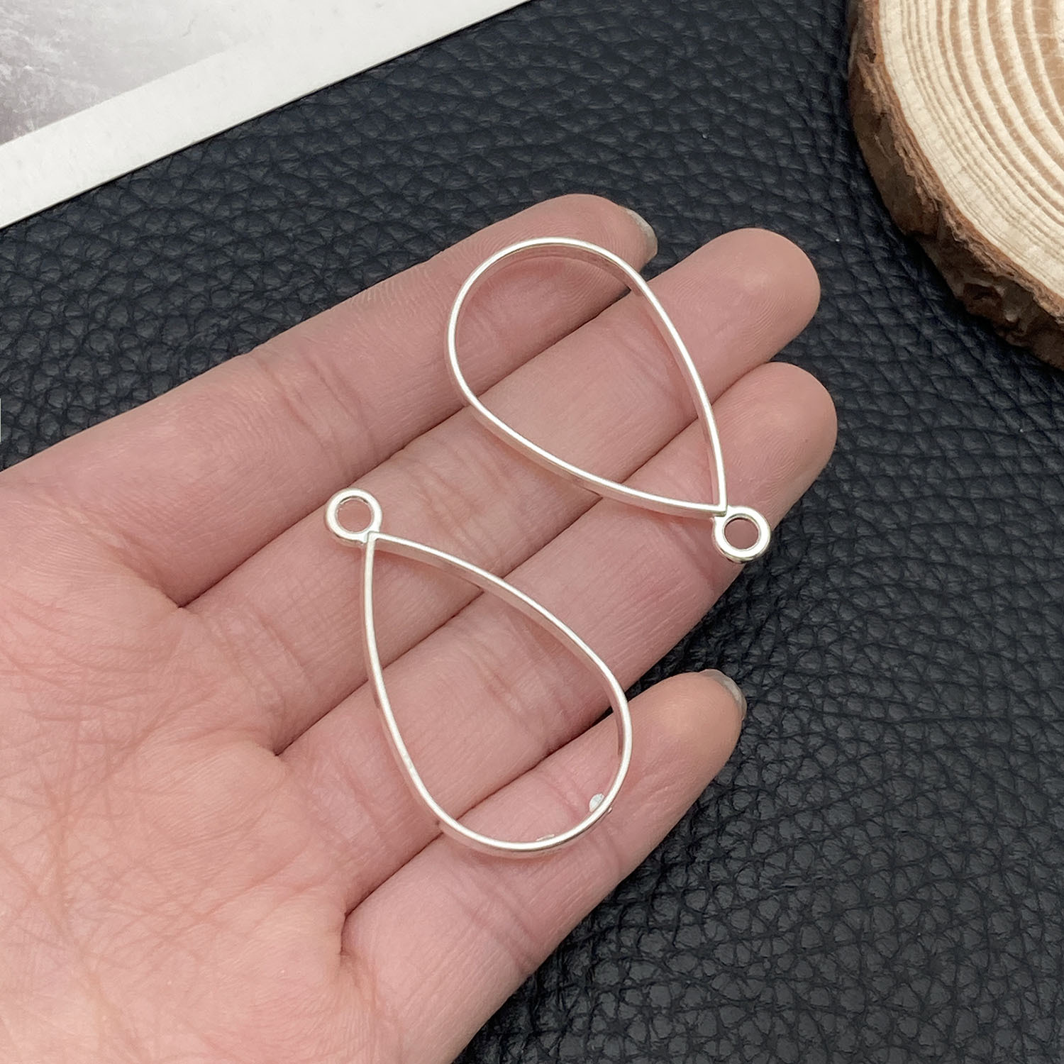 22248-LJ-亮银锌合金水滴形相框边框38x21mm-2