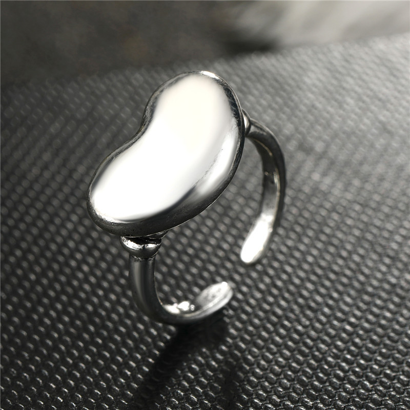 Fashion Geometric Bow Smooth Hollow Metal Ring display picture 8