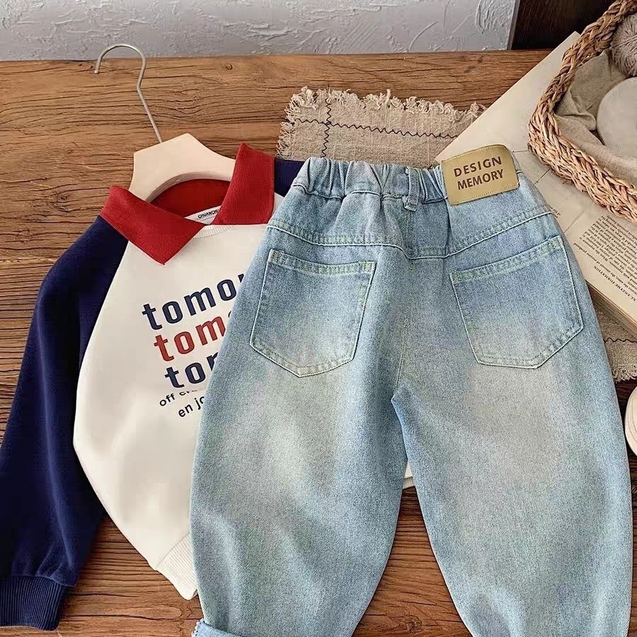 Primavera nueva tendencia de pantalones infantiles, pantalones vaqueros de color ligero coreanos, pantalones casuales de etiqueta simple para niños image 3