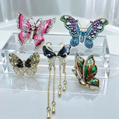 European and American high-end enamel-painted butterfly brooch for women, fashionable oil-drip inlaid with diamonds, high-end niche brooch wholesale