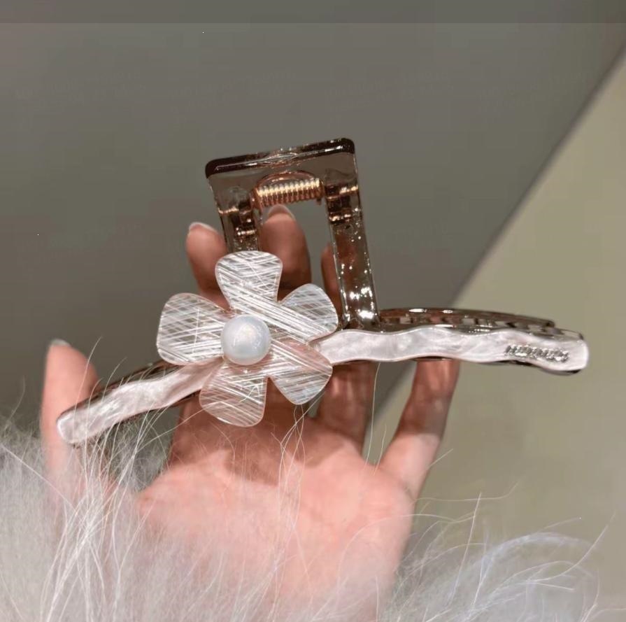 2026 nuevo clip de cabello ondulado clip de cabello de tiburón grande clip de cabello de mujer detrás de la cabeza de alta sensación clip de cabello accesorios para el cabello