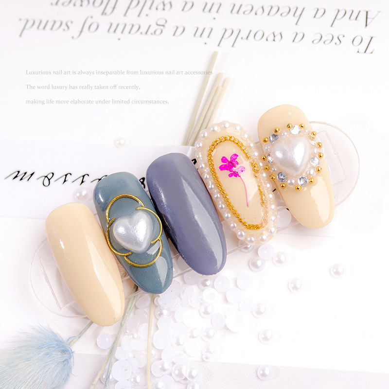 Venta al por mayor blanco beige tamaño semicírculo perla tridimensional paquete DIY hecho a mano uñas joyas de perlas planas