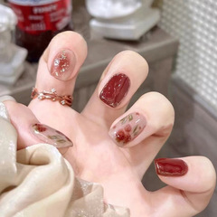 Aesthetic nail art with rose red gold foil gradient stain false nails, ice transparent jujube red wear-on nails, wholesale finished product