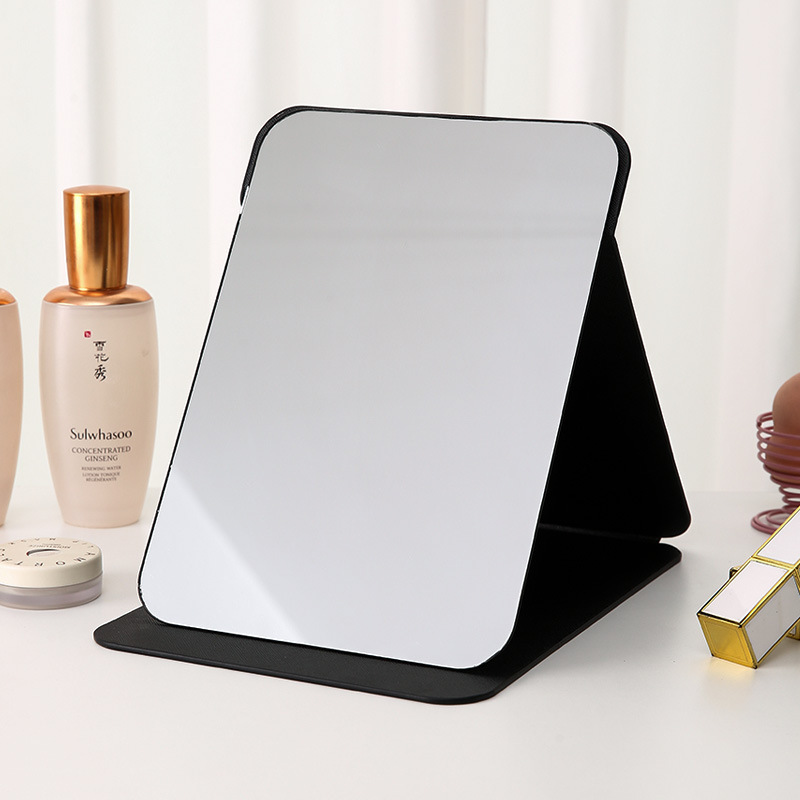 Espejo plegable de cuero PU Dormitorio de estudiantes Espejo de maquillaje de belleza de estilo princesa Espejo de tocador simple de escritorio para el hogar