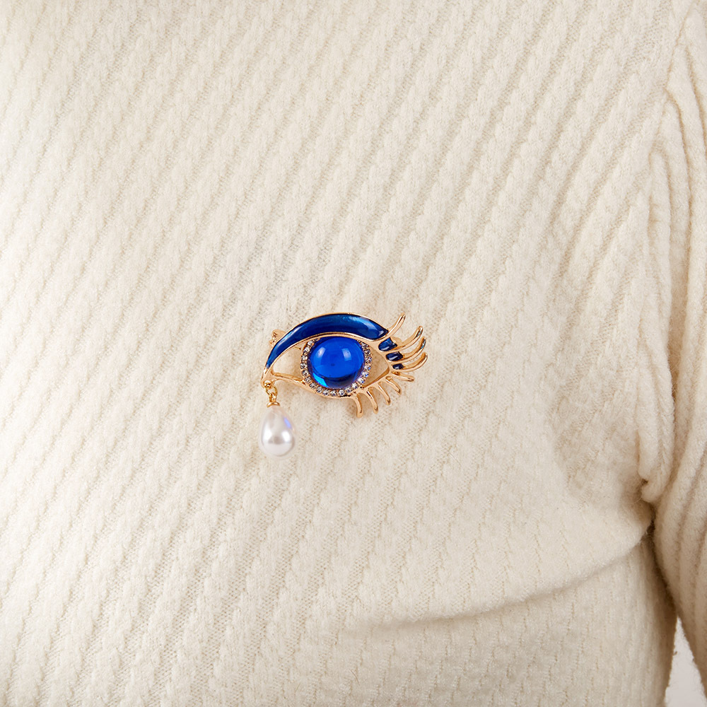 Spilla occhio con perla barocca vintage da donna per tailleur_voghion.com