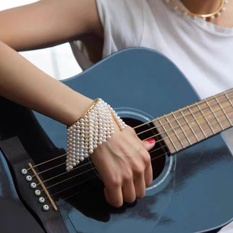 European and American personalized designer Pearl tassel bracelet fashionable elegant socialite bracelet high-grade open bracelet for women