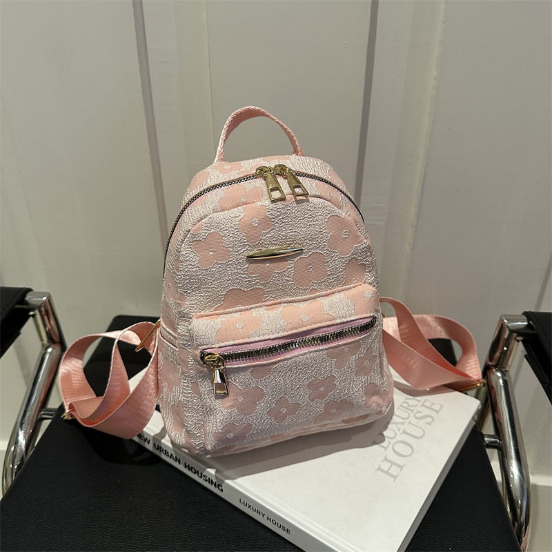 Flores de moda versátil bolsa casual 2024 nicho exterior suave red rojo mochila bolsa de salida popular este año