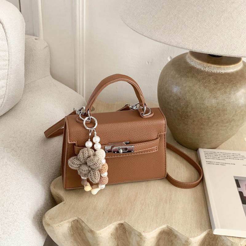 Bolso de mano de alta sensación para mujeres 2026 nuevo retro lichi Kelly bolso nicho lujoso mochila de hombro image 12