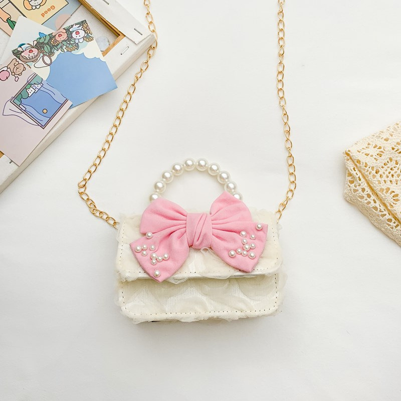 Dulce princesa bolso de hombro de perlas portátiles 2025 mini bolso de cadena de arco para niños