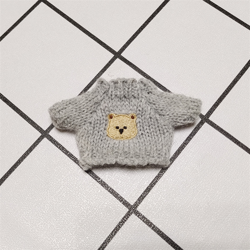 Venta caliente perro cabeza 14cm muñeco de peluche suéter colección de accesorios de ropa rabu ropa spot al por mayor