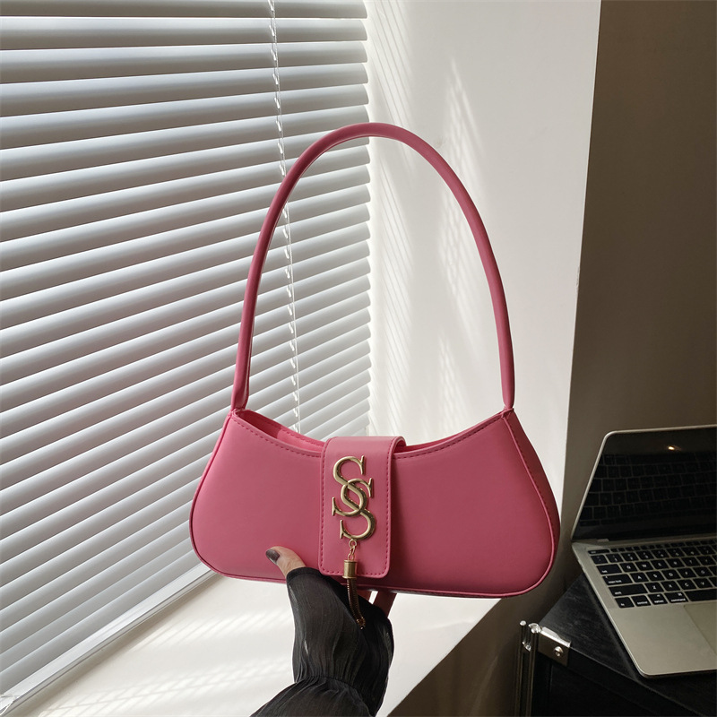 Textura todo-fósforo moda borla bolso de hombro bolso de mujer 2024 otoño e invierno nuevo estilo ligero lujo estilo occidental bolso de axila bolso de moda