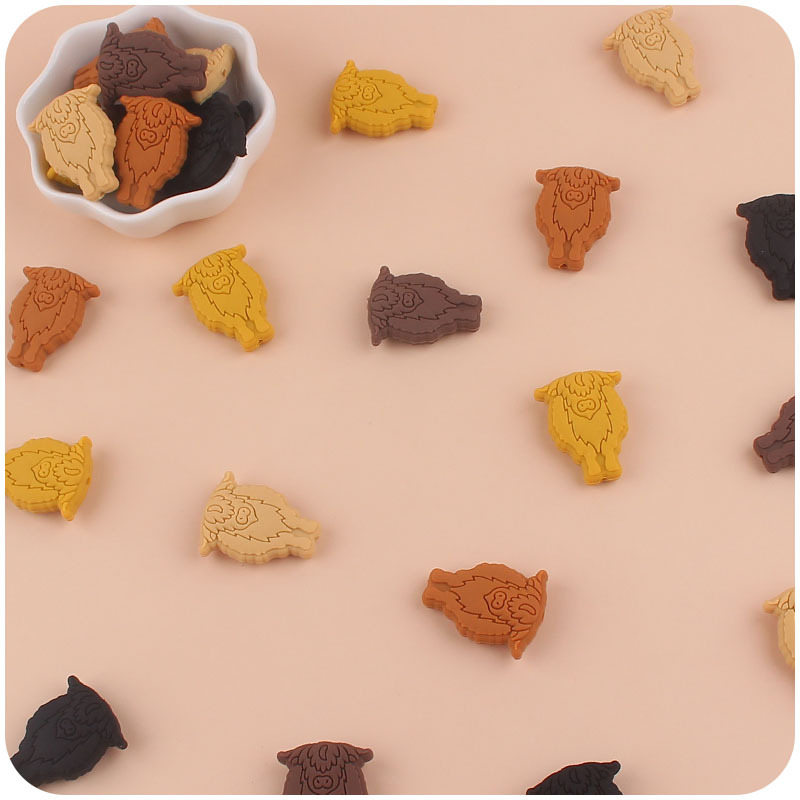 Nuevo bebé suministros de dibujos animados vaca pequeño mordedor creativo DIY bebé molar Cadena de pezón cadena anti-gota accesorios pequeños