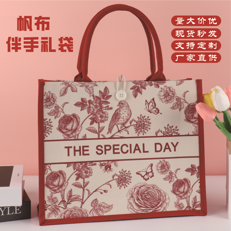 カスタマイズされた赤い高級お祝い誕生日宴会のお返しギフト付きキャンバスギフトバッグ Douyin 同じスタイルのショルダートートバッグ|undefined