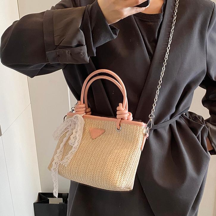 Bolsa de balde de mano de verano explosivo 2025, nueva bolsa de paja de vacaciones en la playa para viajar al trabajo, bolsa de hombro de alta calidad