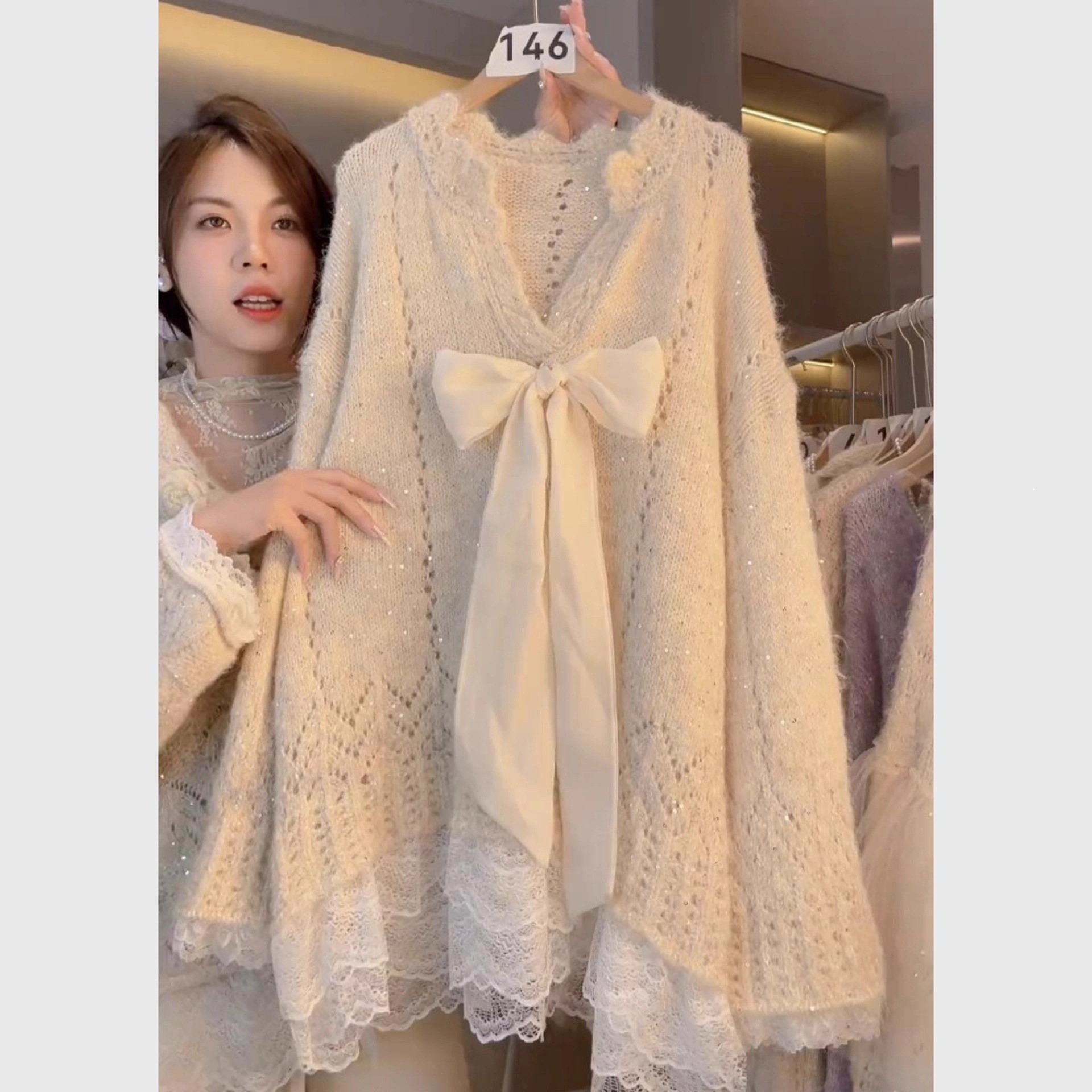 Cute demi-season sweater with bow