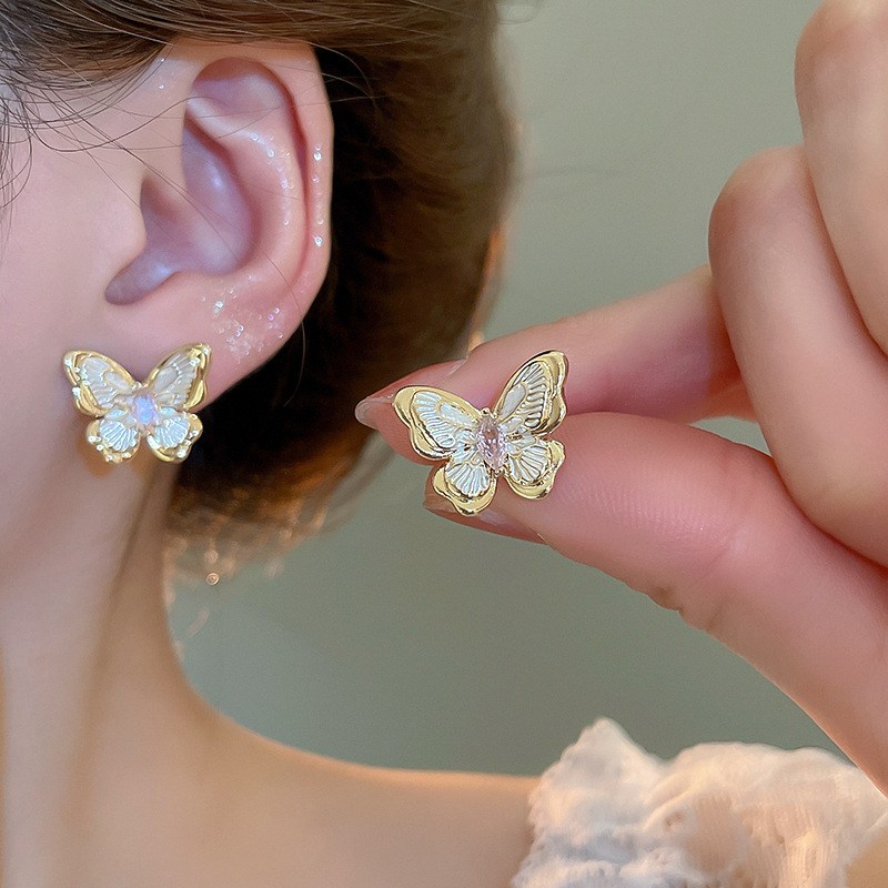 Pendientes de perlas de flor de circón de aguja de plata, pendientes de lujo de alta gama de lujo ligero exquisito, pendientes de todo fósforo blanco de moda de nicho al por mayor