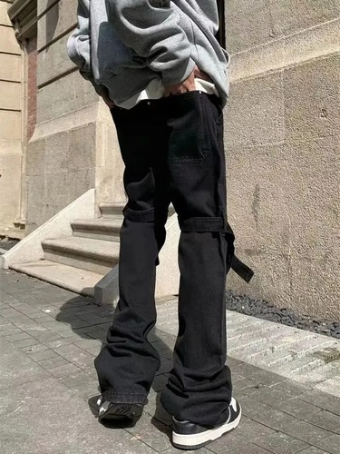 American-style vibe designer pants—Instagram-inspired high-street trendy black denim jeans with tie-up details, featuring a straight-leg silhouette and perfect for Hiphop enthusiasts.