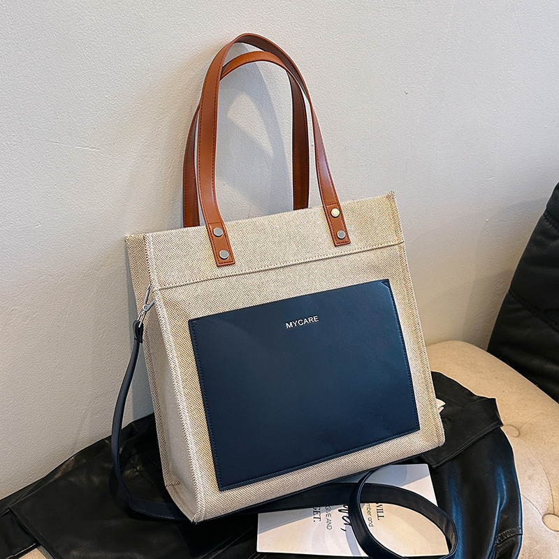 Bolso portátil de lona personalizado para mujer nueva tendencia con logotipo impreso en color casual bolso de mensajero de viaje de negocios