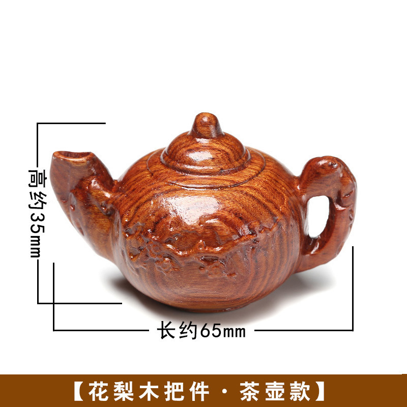 黄花梨の取っ手の件の木はクルミのヒョウタンの十二生肖の文を彫って赤い木の彫刻の小さい掛け金を彫って中実の置物を並べます。|undefined