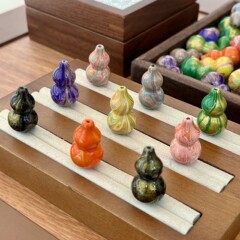 液体の大きい漆のヒョウタンのdiyの部品は手作業で編みます。