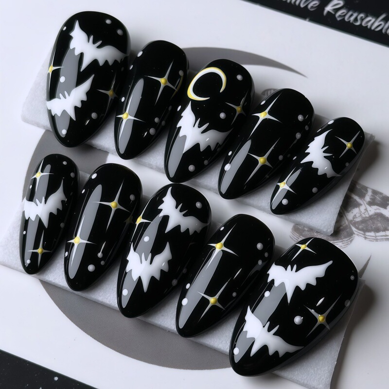 Dark and Sweet Halloween Night Sky Manicure with 3D Stars, Crescent Moon, Polka Dots, and Bat Designs - Short Almond-shaped Press-On Nails Wholesale Dark and Sweet Halloween Night Sky Manicure with 3D Stars, Crescent Moon, Polka Dots, and Bat Designs - Short Almond-shaped Press-On Nails Wholesale