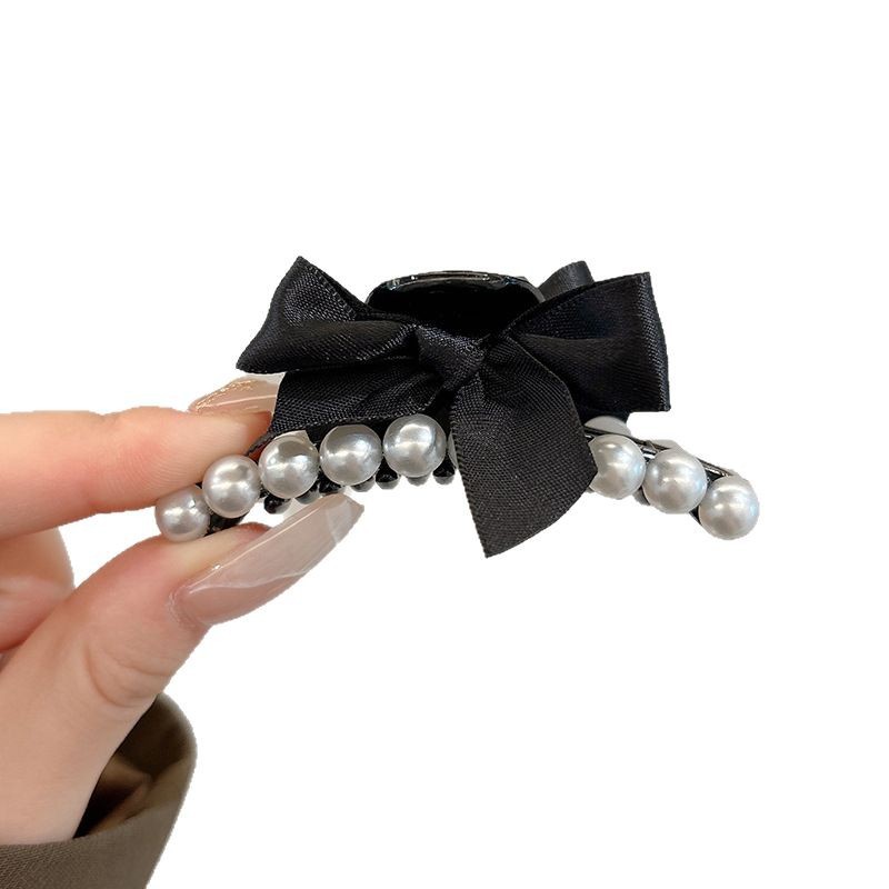 Clips de agarre de arco negro pequeño para mujeres frente retro clips de bangs 2025 nuevo clips de cabello princesa accesorios para el cabello