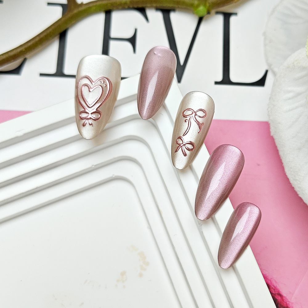 Love Cat Eye Bowknot Wear Armor 10 piezas de estrellas de código dividido uñas hechas a mano Parche de uñas en forma de almendra tridimensional