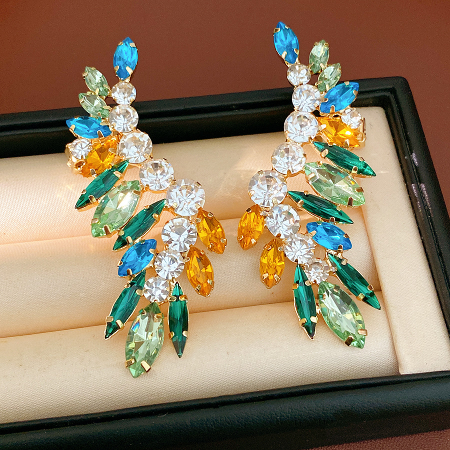 Aguja de plata de color diamantes redondos arroz pendientes ligeros de lujo de alta calidad personalidad exquisita pendientes de moda nicho orejas para mujeres